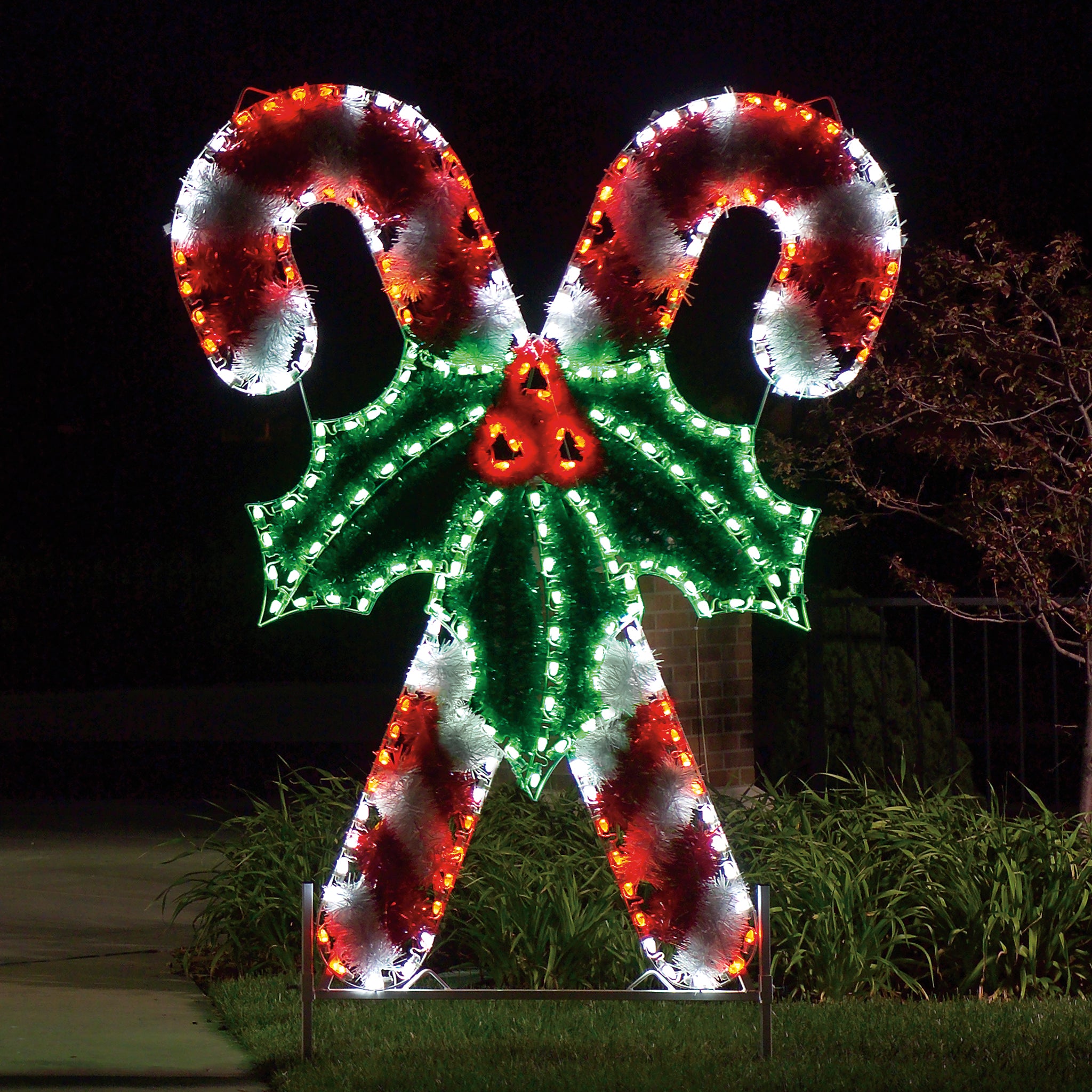 Life-size, giant, candy canes, red bulbs, green bulbs, holiday, traditional outdoor decoration, commercial grade, giant motif, aluminum frame, UV-resistant PVC garland, HolidayLights.com 2021